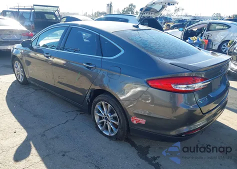2017 Ford Fusion Energi Titanium from USA, damaged, VIN 3FA6P0SU8HR350502